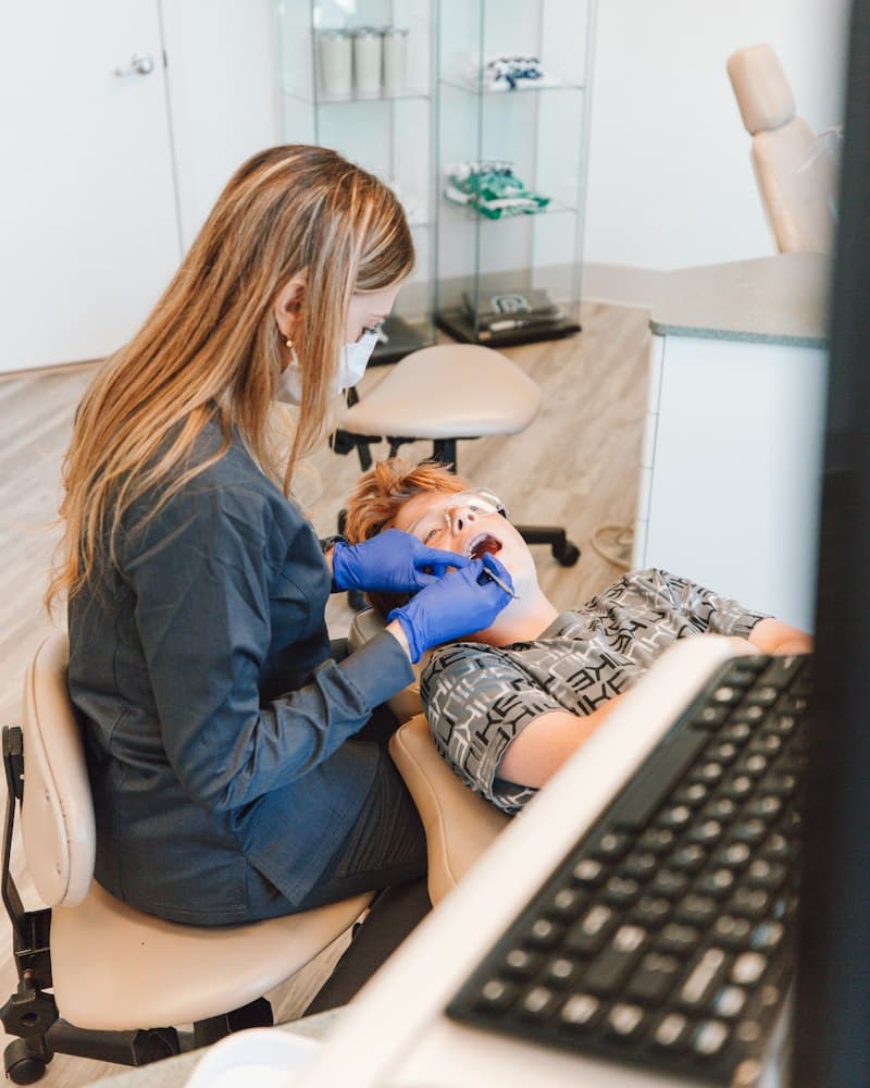 Hygienist with a young patient